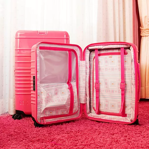 The Carry-On Roller in Barbie Pink